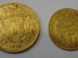 deux pièces d'or sur lesquelles figure un blason