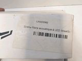 a person holding a white box with a barcode on it