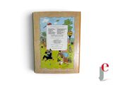 an old children ' s book with a picture of a man and a woman sitting on the grass