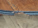 a close up of a piece of wood on a table