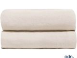 a close up of two sheets folded on top of each other