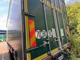 a truck that is parked on the side of the road