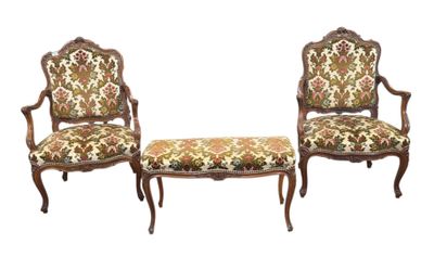 two chairs and a bench with a floral upholstered seat