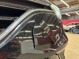 a close up of a car ' s bumper with a sticker on it