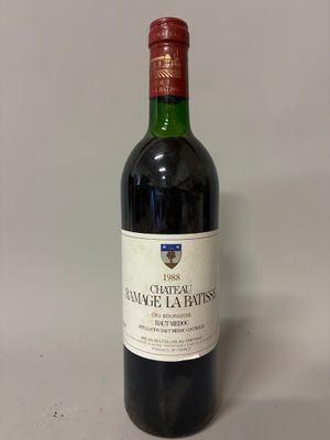a bottle of wine that is sitting on a table