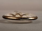 an image of a gold plated ring with a cross on it