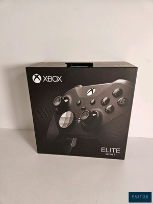 the box of the xbox elite controller is open on the table