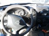 dashboard of a car with a steering wheel and dashboard controls