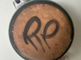 a cup of coffee with the word r o written on it