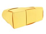 a yellow box with a handle on a white background