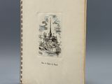 un vieux livre sur lequel figure le dessin d'un bateau dans l'eau