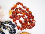 a lot of beads that are sitting on a table