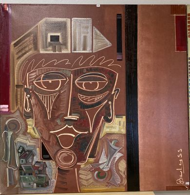 une peinture représentant le visage d'un homme sur le mur