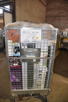 a cart with a bunch of items in it in a warehouse