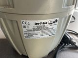 a close up view of a tank with a power cord attached to it