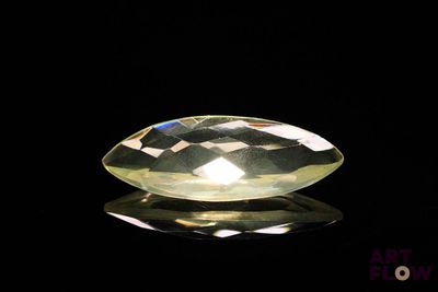 an image of a yellow diamond on a black surface