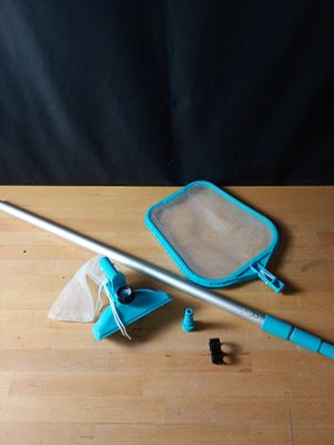 a mop and a bag on a table