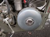 a close up view of a motorcycle engine and its gear