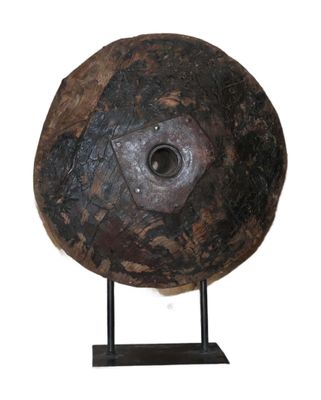 an image of a large metal object on a stand