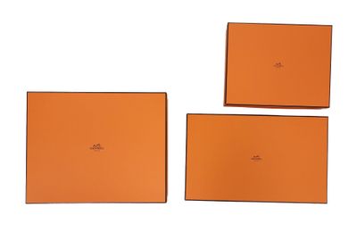 three pieces of orange leather with a white background