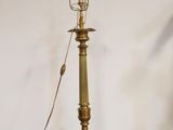 a lamp that is on top of a wooden table