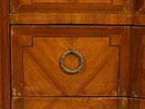 a wooden dresser with three drawers and a mirror
