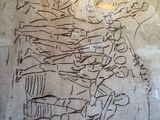 a drawing of a man and a woman on a wall
