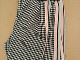 a close up of a black and white scarf on a mannequin mannequin mannequin mannequin mannequin mannequin mannequin