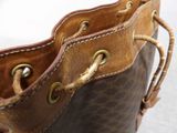 a close up of a brown bag with a handle