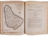 an open book with a map of the island of barbados on it