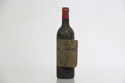 a bottle of wine that is sitting on a table