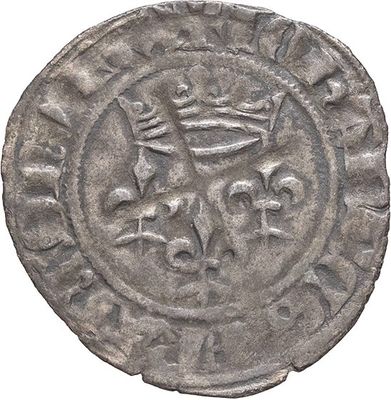a close up of a coin with a crown on it