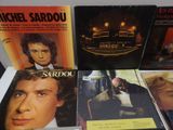 a lot of movies that are on display on the table