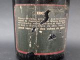 a close up of a bottle of wine on a table