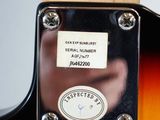 a close up of a guitar with a label on it