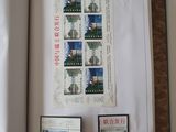 a picture of a book with stamps on it and a picture of a man