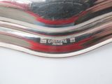 a close up of a fork and spoon on a table