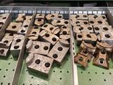 many pieces of wood that are on a conveyor belt