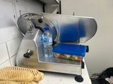 a sandwich and a bottle of water sitting on a counter