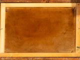 a close up of an old wooden frame with a brown background