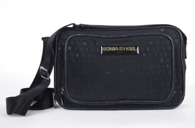 a close up of a black bag with a black strap