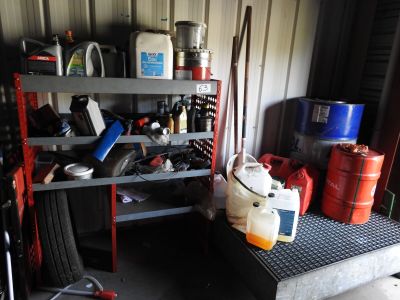 a garage with a lot of items on the shelves