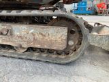 an image of a close up of a tractor track