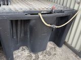 an image of a truck bed with a green lid