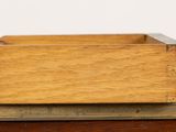 a wooden box sitting on top of a table