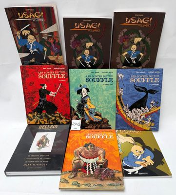 six children ' s books are lined up on a white surface