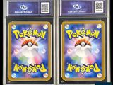 two pokemon trading cards are on display in front of a black background