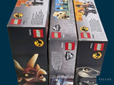 three boxes of legos that are sitting on a table