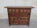 an image of a wooden cabinet with two doors and a drawer