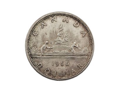 gros plan d'une pièce de monnaie sur une surface blanche avec un fond blanc